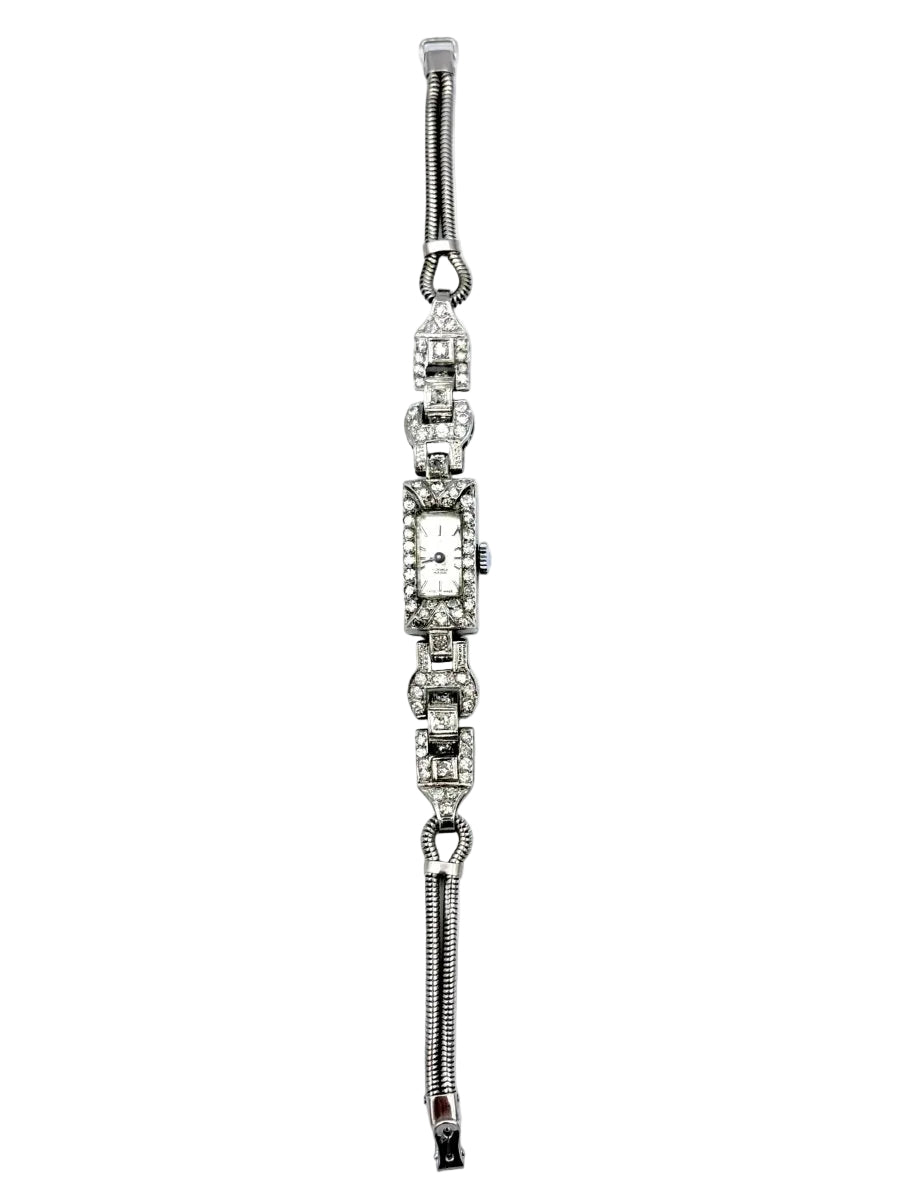 Montre Art-Déco en platine, or et diamants - Castafiore