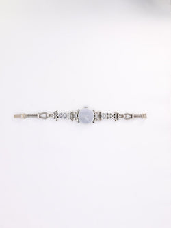 Montre Art Deco or blanc platine diamants - Castafiore