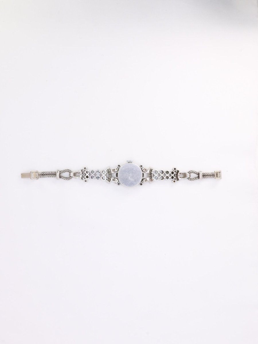 Montre Art Deco or blanc platine diamants - Castafiore