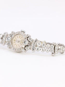 Montre Art Deco or blanc platine diamants - Castafiore