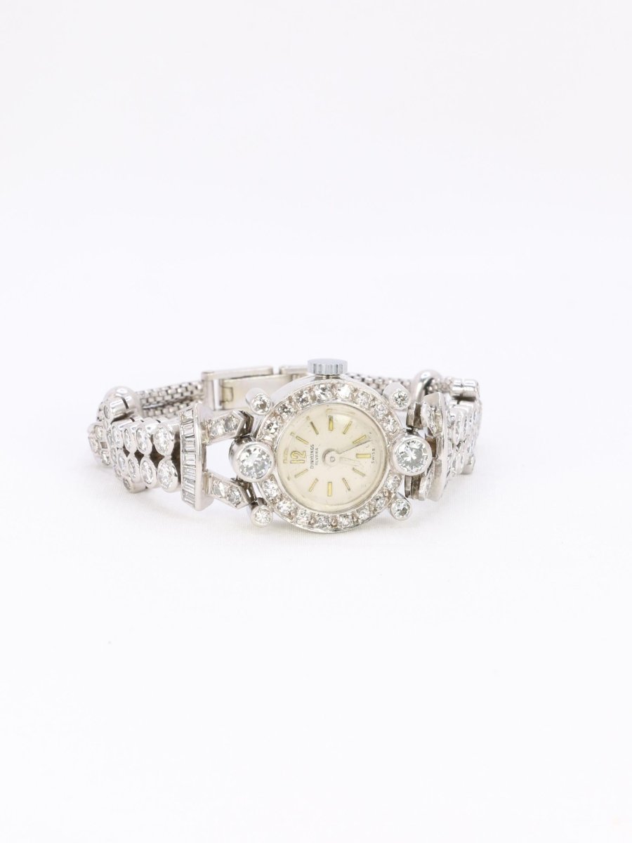 Montre Art Deco or blanc platine diamants - Castafiore