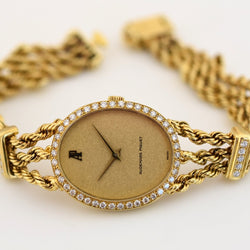 Montre AUDEMARS PIGUET "Classique" en or jaune et diamants - Castafiore