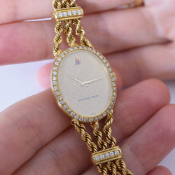 Montre AUDEMARS PIGUET "Classique" en or jaune et diamants - Castafiore