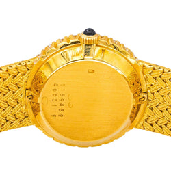 Montre BAUME & MERCIER en or jaune, quartz et diamants - Castafiore