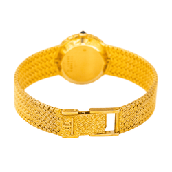 Montre BAUME & MERCIER en or jaune, quartz et diamants - Castafiore