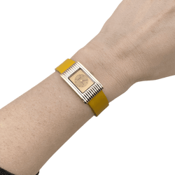 Montre BOUCHERON "Reflet" en or jaune, acier et cuir - Castafiore