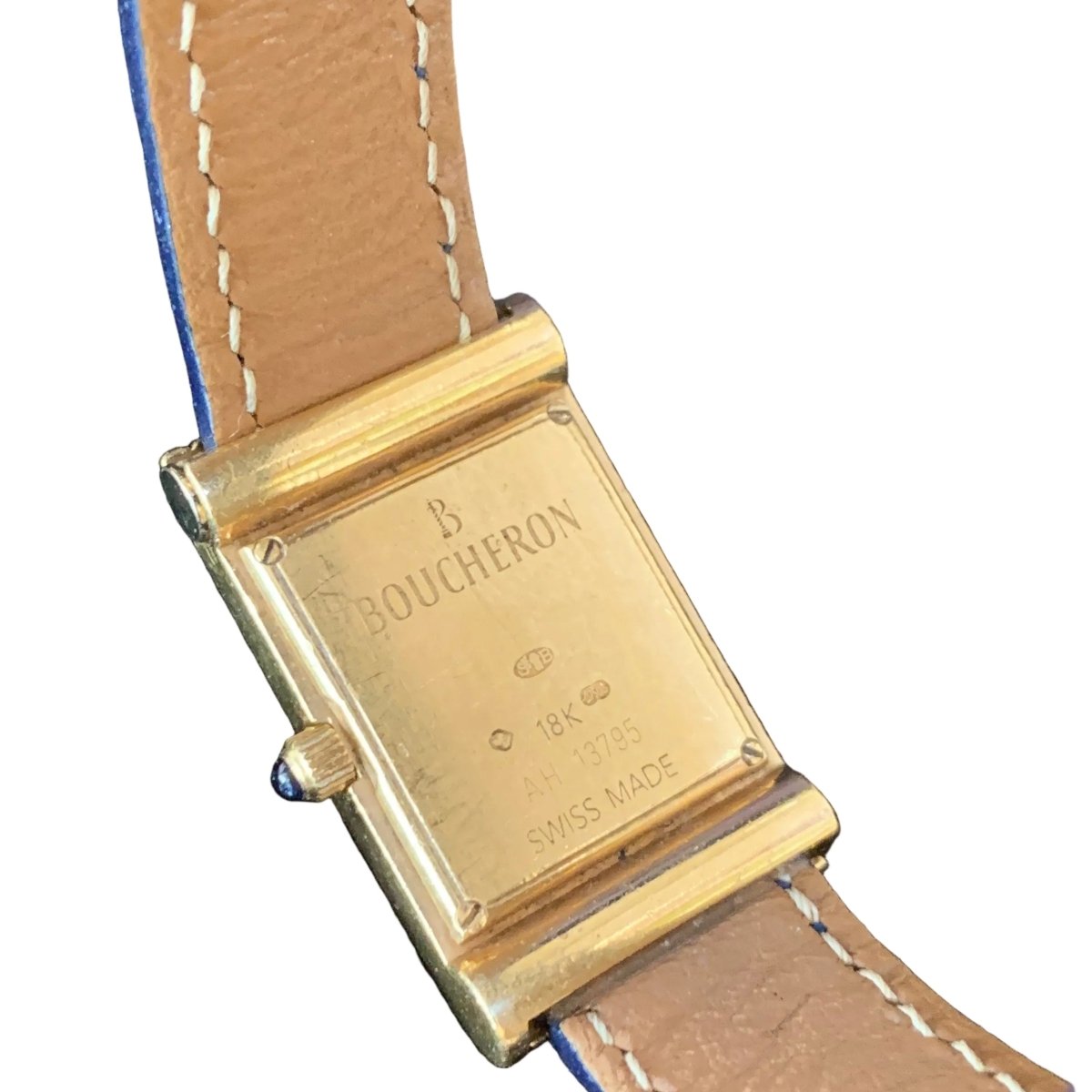 Montre BOUCHERON "Reflet" en or jaune, cuir et quartz - Castafiore