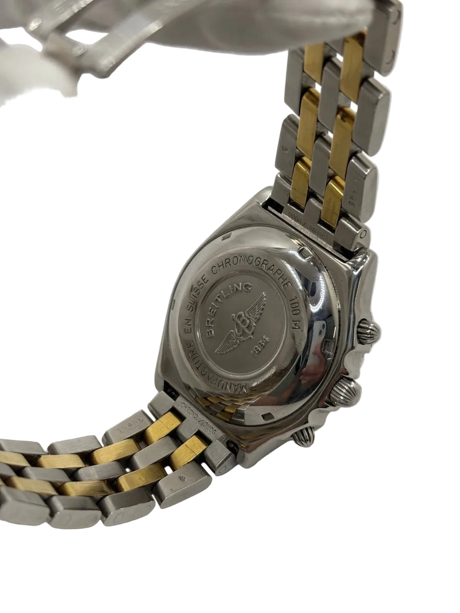 Montre Breitling Chronomat en or et acier - Castafiore
