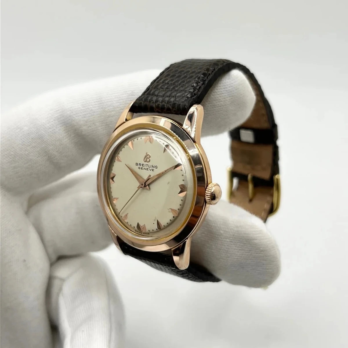 Montre BREITLING "Genève" plaqué or rose, acier et cuir - Castafiore