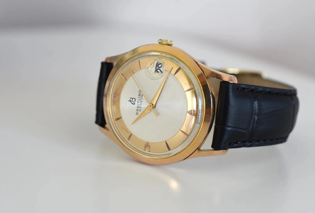 Montre BREITLING Réf. 4002, en plaqué or et acier - Cadran bicolore, Venus 227, Vers 1956. - Castafiore