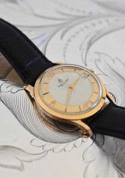 Montre BREITLING Réf. 4002, en plaqué or et acier - Cadran bicolore, Venus 227, Vers 1956. - Castafiore
