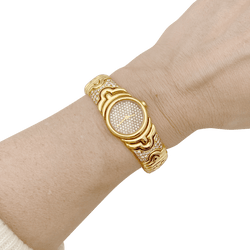 Montre BULGARI "Parentesi" en or jaune et diamants - Castafiore