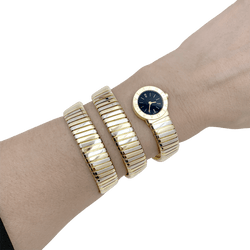 Montre BULGARI "Tubogas" en or jaune et or blanc - Castafiore