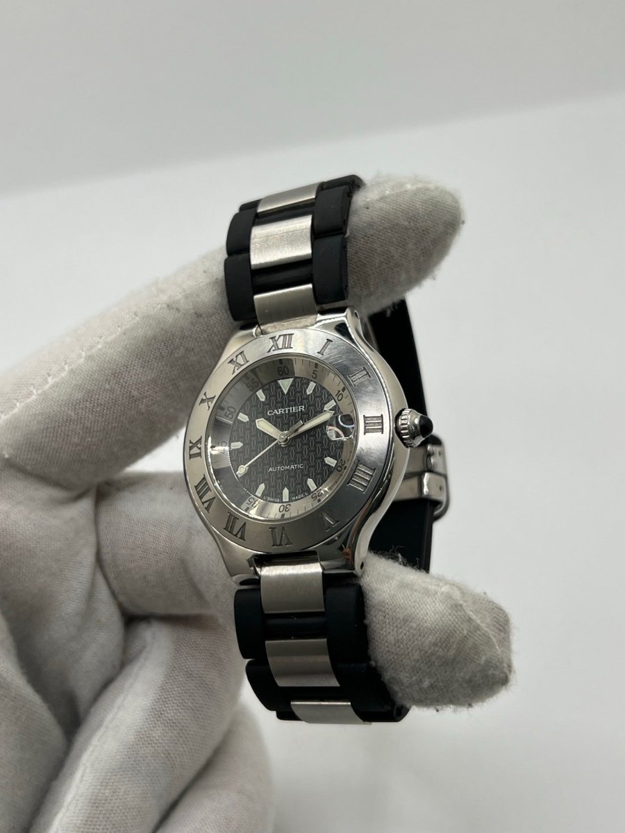 Montre CARTIER "21 Must de Cartier" en acier et caoutchouc - Castafiore