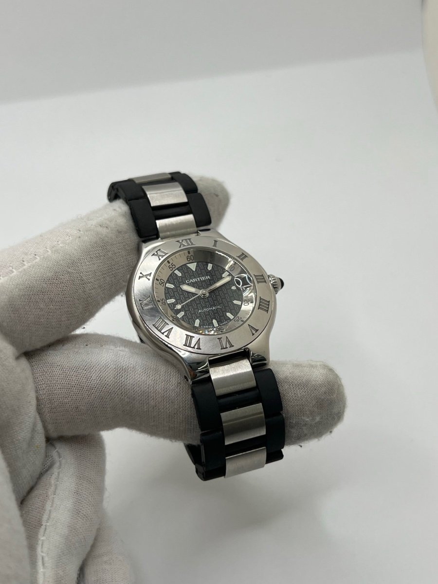 Montre CARTIER "21 Must de Cartier" en acier et caoutchouc - Castafiore