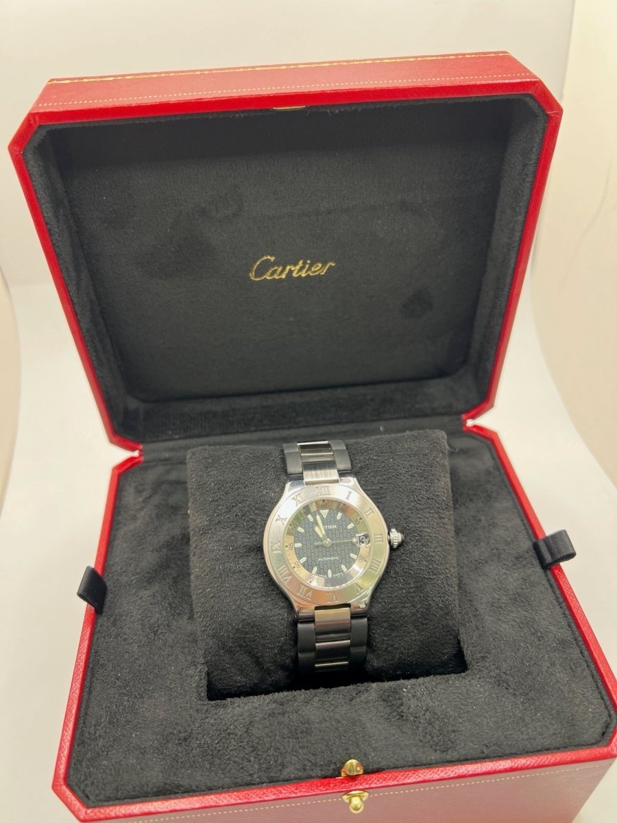 Montre CARTIER "21 Must de Cartier" en acier et caoutchouc - Castafiore