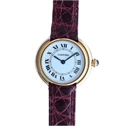 Montre CARTIER "Ellipse" en or jaune et cuir - Castafiore