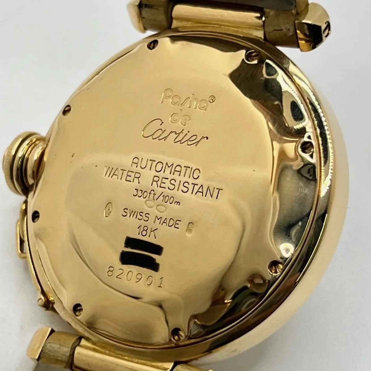 Montre CARTIER "Pasha" en or jaune, or rose, cuir et diamants - Castafiore