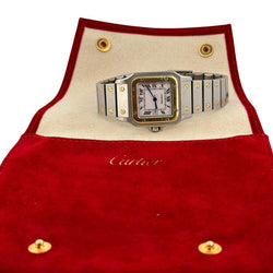 Montre CARTIER "Santos" en or jaune, acier et saphir - Castafiore