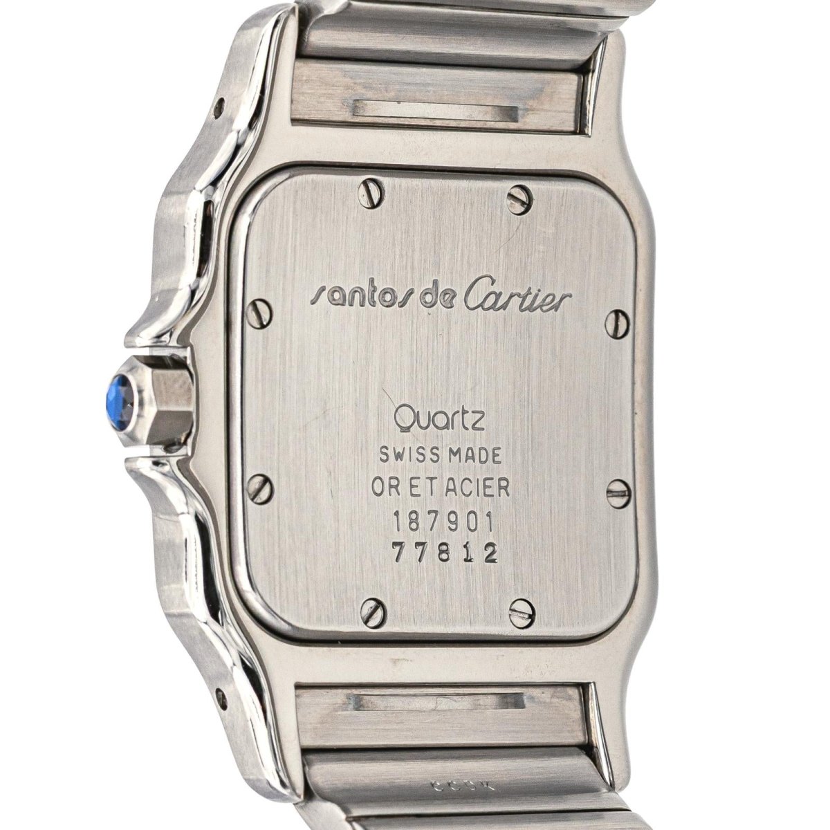 Montre Cartier "Santos" en or jaune, acier, saphir, spinelle et quartz - Castafiore