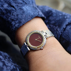 Montre Cartier Santos en or jaune et acier - Castafiore