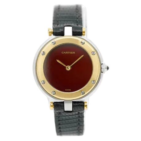 Montre CARTIER "Santos Vendôme Lady" en or jaune, acier et cuir - Castafiore