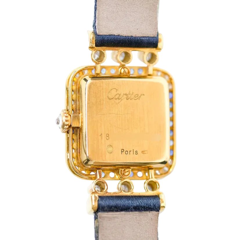 Montre CARTIER "Sonate" en or jaune, saphirs et diamants - Castafiore