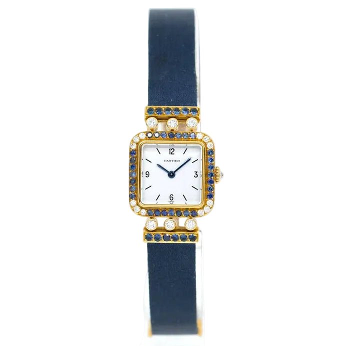 Montre CARTIER "Sonate" en or jaune, saphirs et diamants - Castafiore