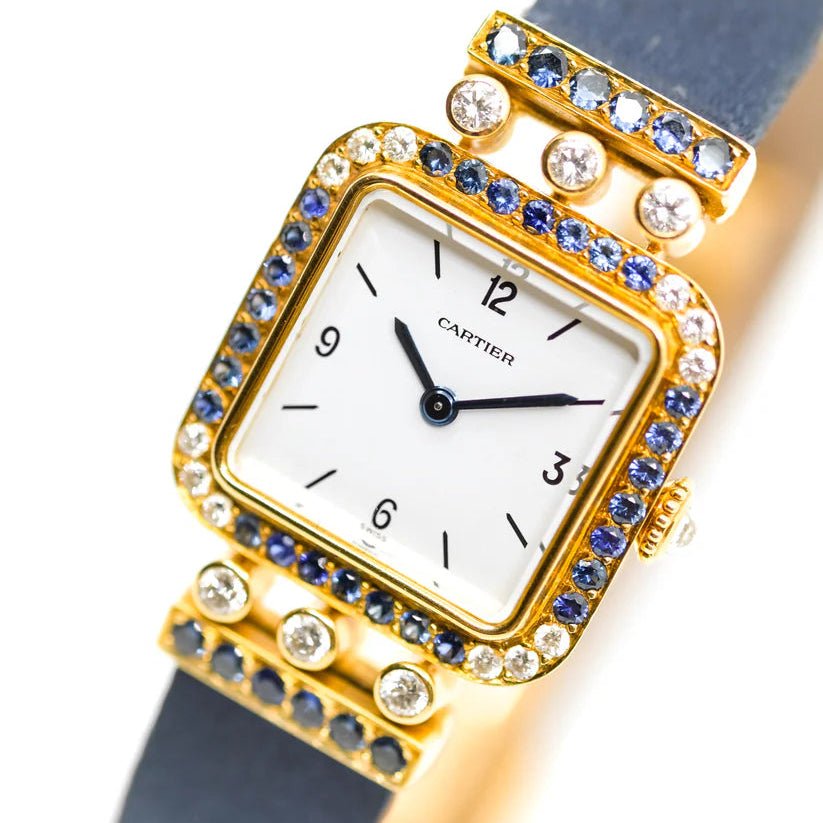 Montre CARTIER "Sonate" en or jaune, saphirs et diamants - Castafiore