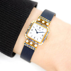 Montre CARTIER "Sonate" en or jaune, saphirs et diamants - Castafiore