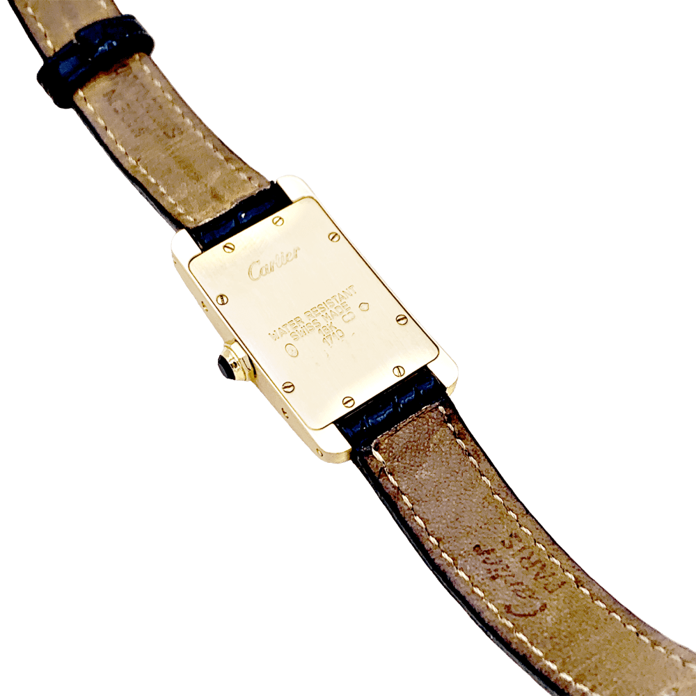 Montre CARTIER "Tank Américaine" en or jaune, acier et cuir - Castafiore
