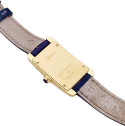 Montre CARTIER "Tank Américaine" en or jaune, acier et cuir - Castafiore