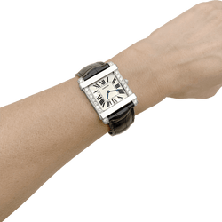 Montre CARTIER "Tank Chinoise" en or blanc, platine, cuir, acier et diamants - Castafiore