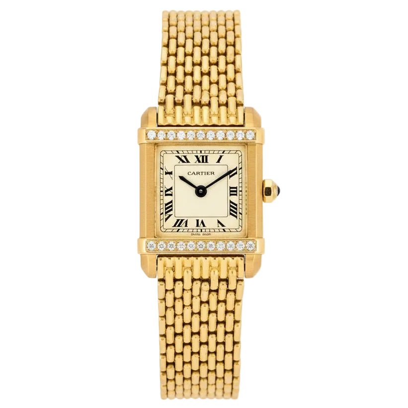 Montre CARTIER "Tank Chinoise" en or jaune, acier et diamants - Castafiore
