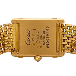 Montre CARTIER "Tank Chinoise" en or jaune, acier et diamants - Castafiore