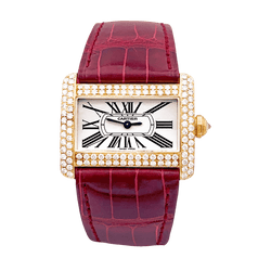 Montre CARTIER "Tank Divan" en or jaune, argent, acier et diamants - Castafiore