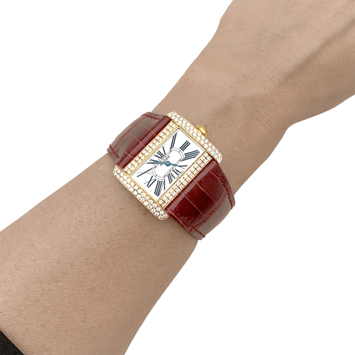 Montre CARTIER "Tank Divan" en or jaune, argent, acier et diamants - Castafiore