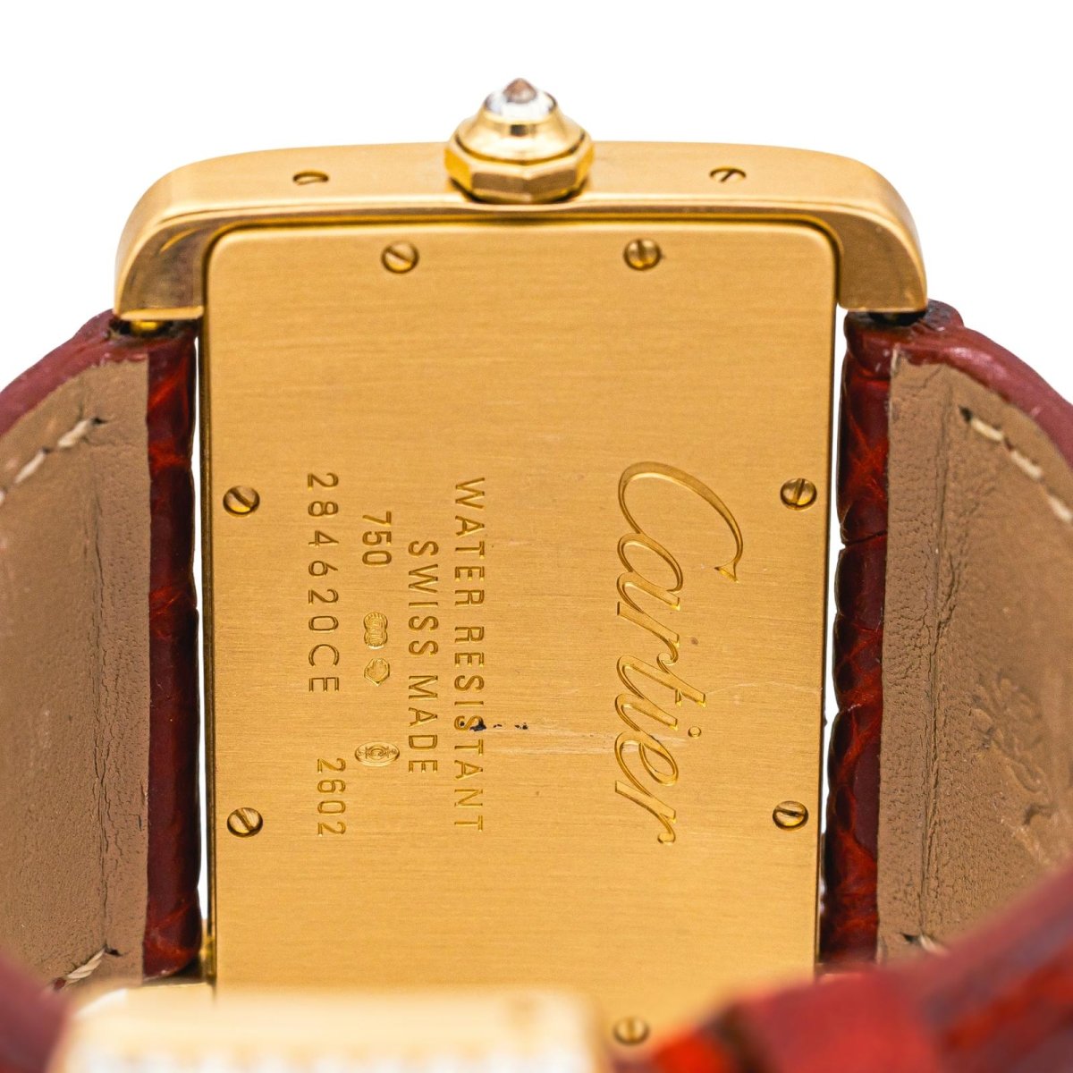 Montre CARTIER "Tank Divan" en or jaune, cuir et diamants - Castafiore