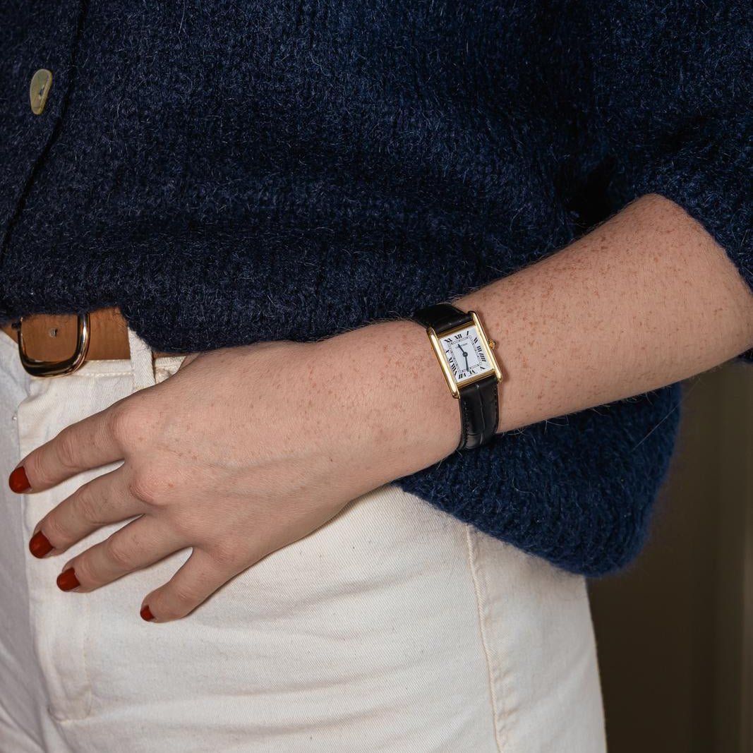 Montre CARTIER "Tank" en or jaune, cuir et saphir - Castafiore