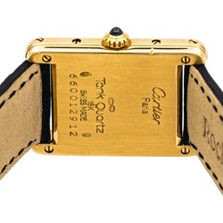 Montre CARTIER "Tank" en or jaune, cuir et saphir - Castafiore
