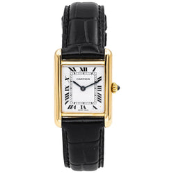 Montre CARTIER "Tank" en or jaune, cuir et saphir - Castafiore