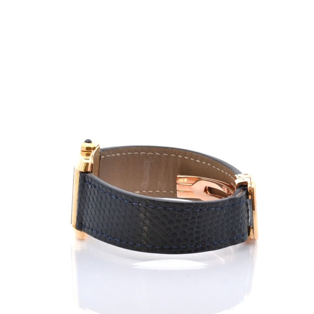 Montre CARTIER "Tank" en or jaune, cuir, saphir et quartz - Castafiore