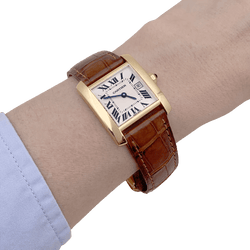 Montre Cartier, "Tank Française", or jaune, cuir. - Castafiore