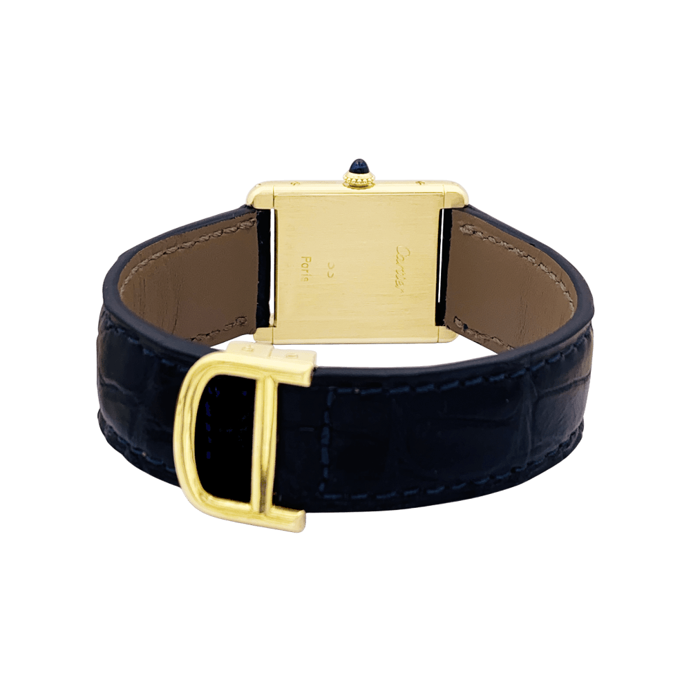 Montre CARTIER "Tank Louis Cartier" en or jaune, acier, cuir et spinelle - Castafiore