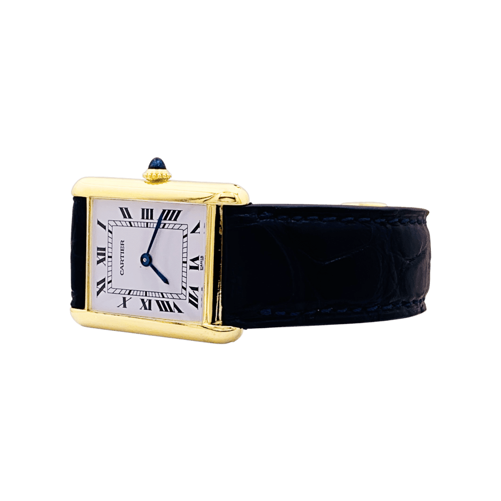 Montre CARTIER "Tank Louis Cartier" en or jaune, acier, cuir et spinelle - Castafiore