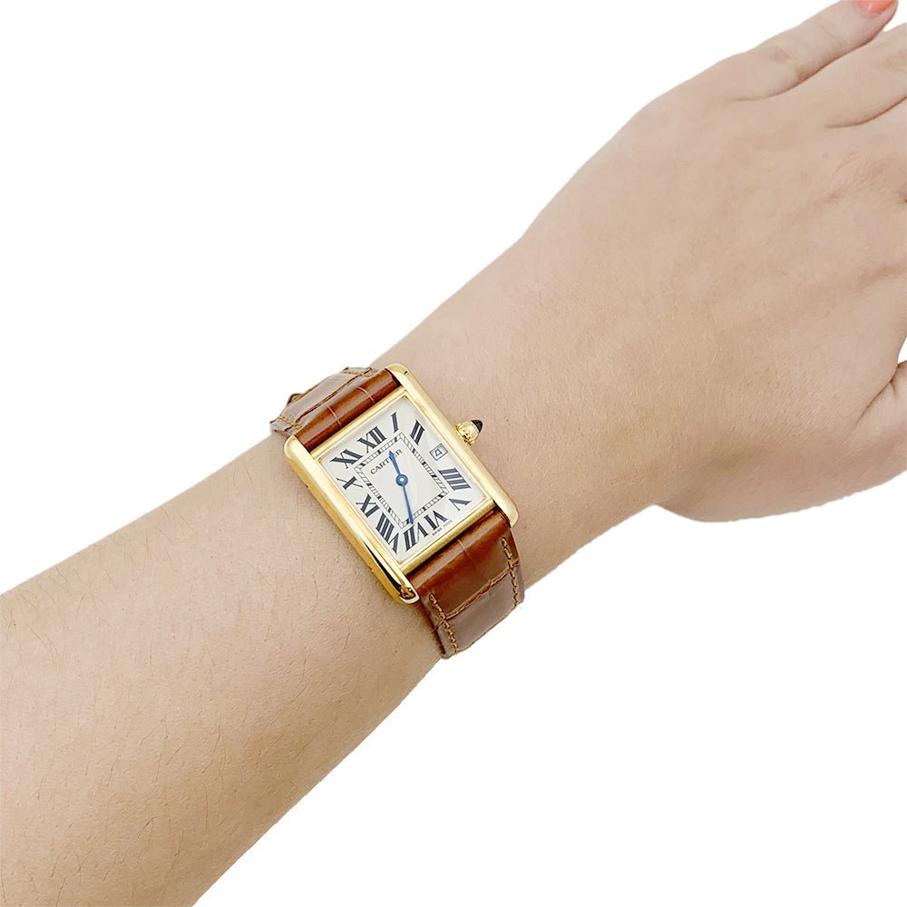 Montre CARTIER "Tank Louis Cartier" en or jaune et cuir - Castafiore