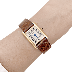 Montre CARTIER "Tank Louis Cartier" en or jaune et cuir - Castafiore