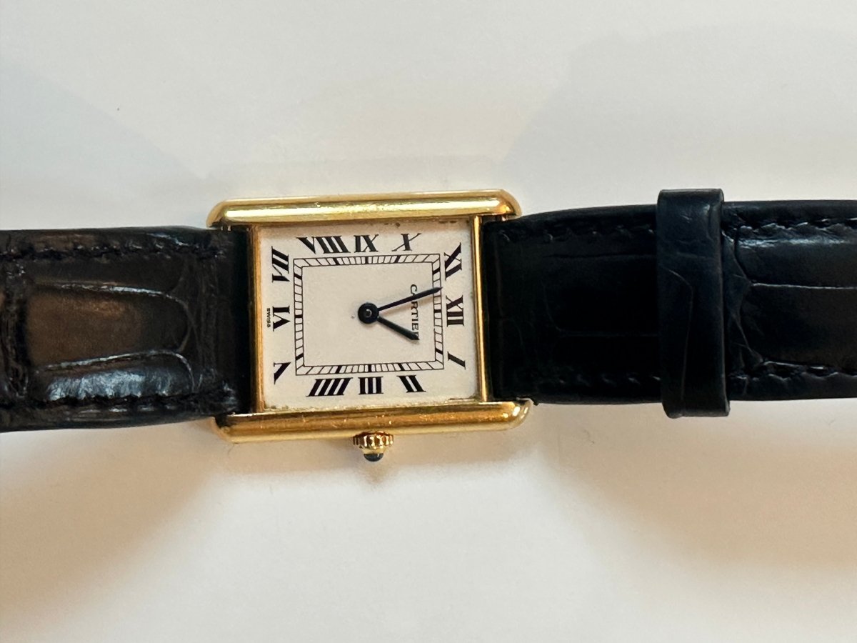Montre CARTIER "Tank Louis" en or jaune, cuir et quartz - Castafiore