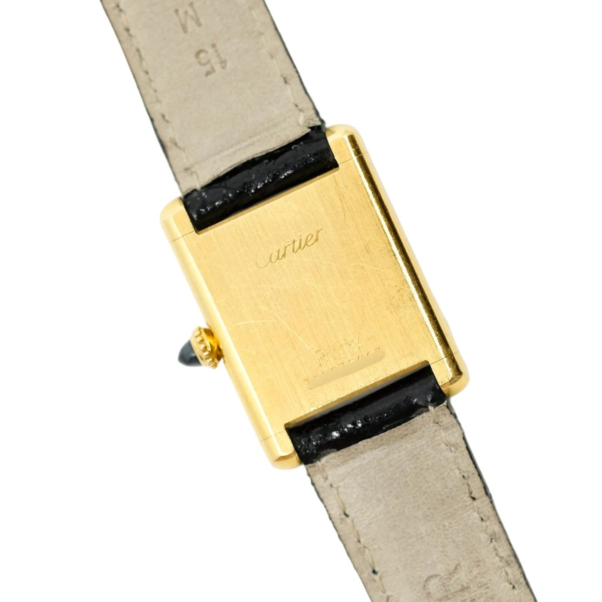 Montre CARTIER "Tank Louis" en or jaune, cuir et saphir - Castafiore