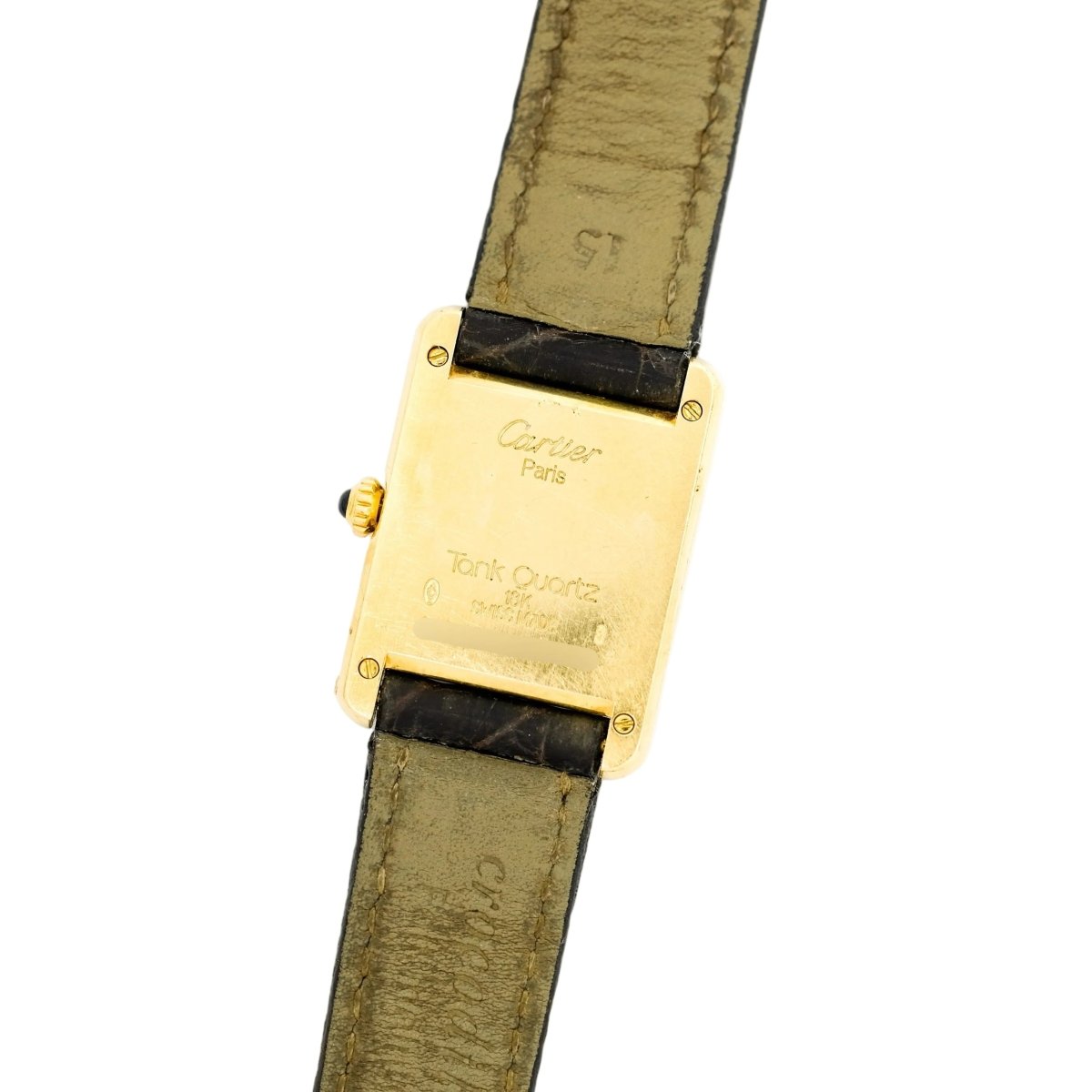 Montre CARTIER "Tank Louis" en or jaune, cuir, quartz et saphir - Castafiore